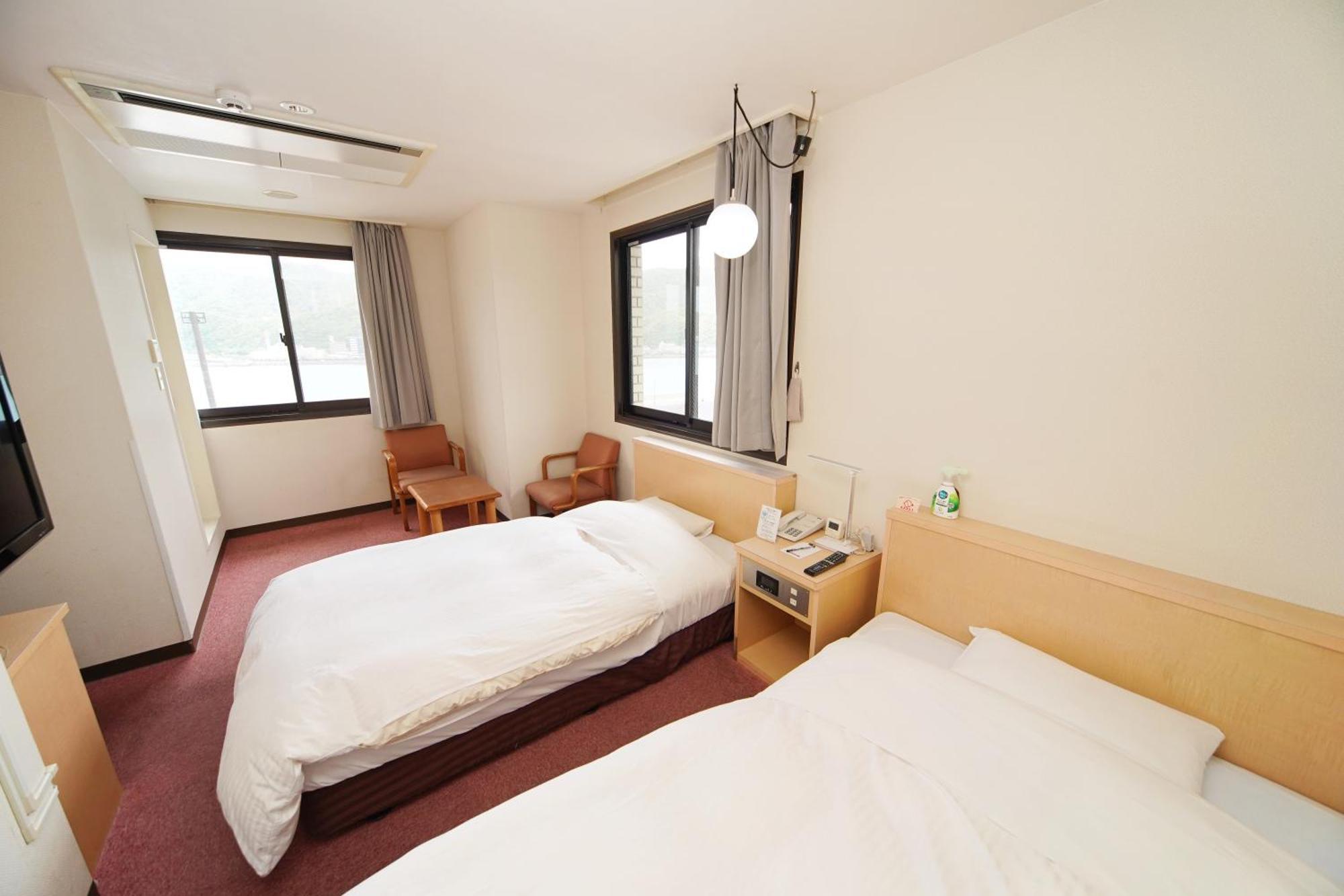 Amami Port Tower Hotel Exterior foto