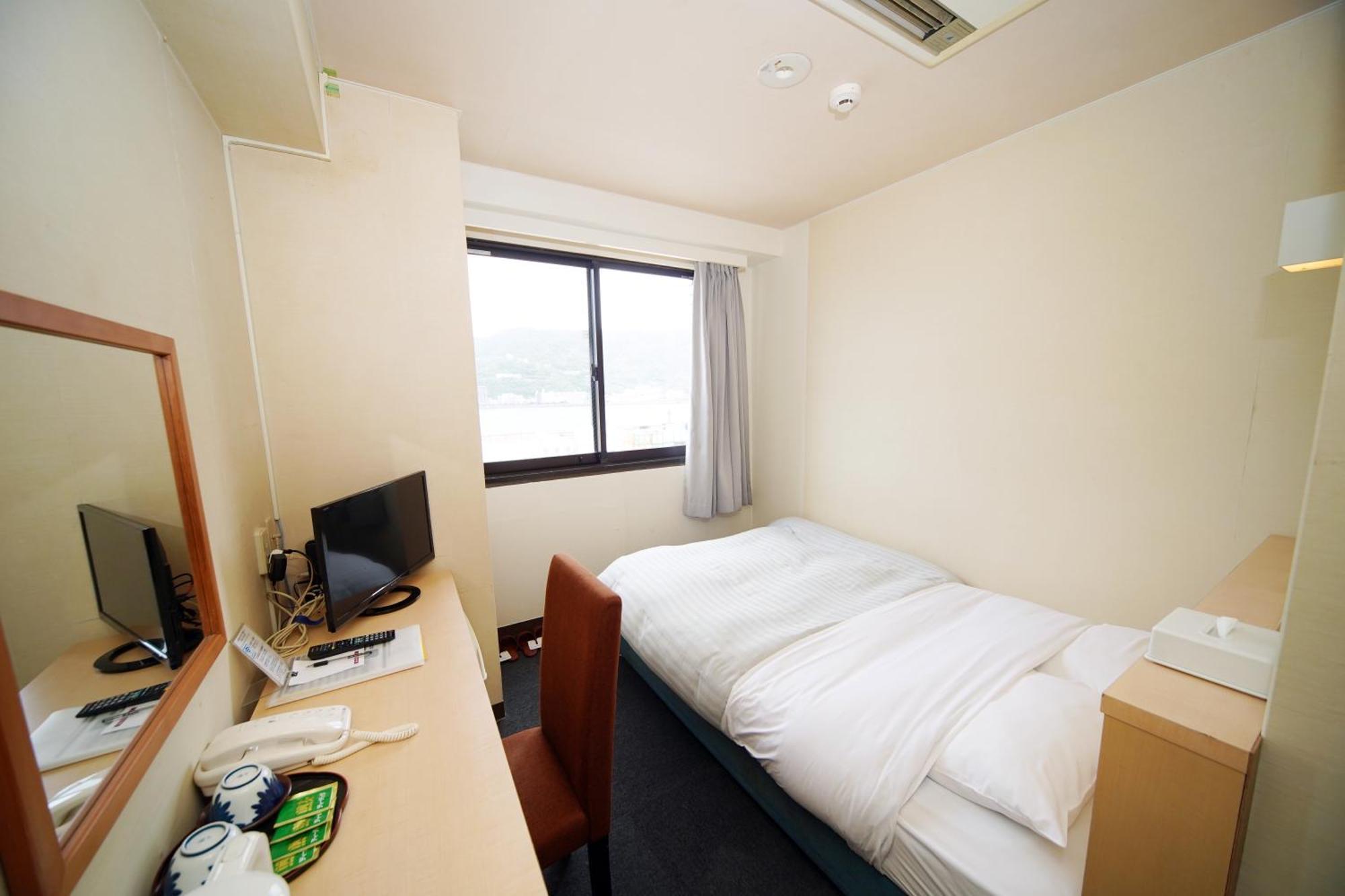 Amami Port Tower Hotel Exterior foto